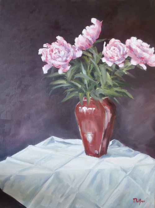 Vase sur la nappe blanche